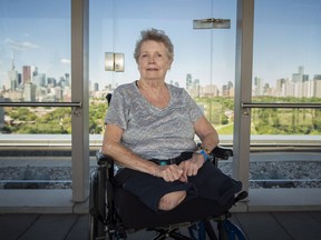 Beverly Smith, a survivor of the Yonge Street van attack, poses for a photo on the rooftop patio at Bridgepoint Health in Toronto on Friday, July 6, 2018.