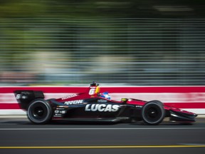 Robert Wickens races down the track during the practice session of the Honda Indy Toronto (The Canadian Press)