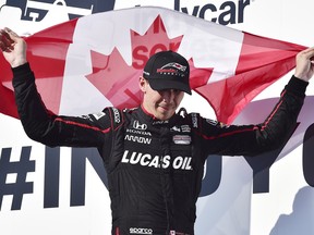 Robert Wickens celebrates his third place finish at the Honda Indy in Toronto on Sunday, July 15, 2018. (THE CANADIAN PRESS/Frank Gunn)