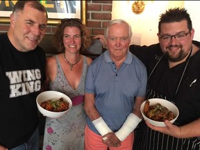 Wing masters from left to right: Drew Cerza, aka Wing King, Stacey Shatzel, her dad David with chef Nick Rada. (Keven Hann/Postmedia Network)