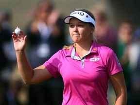 Brooke Henderson of Canada reacts after sinking her final putt on the 18th green to take the overnight lead during the third round of the CP Womens Open at the Wascana Country Club on August 25, 2018 in Regina, Canada.