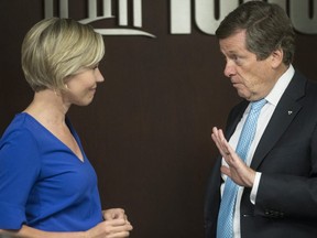 Mayor John Tory and Jennifer Keesmaat talk after a committee meeting in June. (Craig Robertson, Toronto Sun)