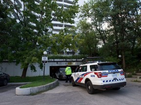 Toronto Police at the scene of a fatal hit-and-run in the underground parking garage at 50 Graydon Hall Dr., near Don Mills Rd. and Highway 401, Aug. 25, 2018. (Victor Biro/Special to Toronto Sun)