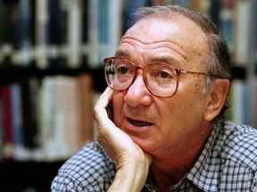 In this Sept. 22, 1994, file photo, American playwright Neil Simon answers questions during an interview in Seattle, Wash. (AP Photo/Gary Stuart, File)