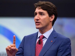 Prime Minister Justin Trudeau addresses the 'NATO Engages: The Brussels Summit Dialogue' at NATO headquarters in Brussels on July 11, 2018.