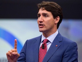 Prime Minister Justin Trudeau addresses the ‘NATO Engages: The Brussels Summit Dialogue’ at NATO headquarters in Brussels on July 11, 2018.