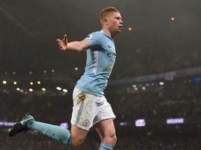 Manchester City's Belgian midfielder Kevin De Bruyne celebrates after scoring during the English Premier League football match between Manchester City and Tottenham Hotspur last season. GETTY IMAGES