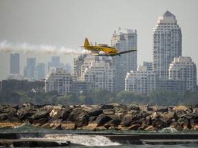 The Canadian Harvard Aerobatic Team performs on the final day of the CNE International Air Show on Monday September 4, 2017. (Ernest Doroszuk/Toronto Sun)