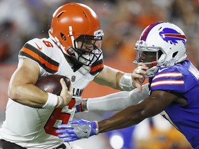 Baker Mayfield of the Cleveland Browns gets tackled while trying to pass by Levi Wallace of the Buffalo Bills at FirstEnergy Stadium on August 17, 2018 in Cleveland. (Joe Robbins/Getty Images)