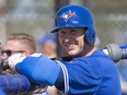 Toronto Blue Jays Troy Tulowitzki leans on a batting cage at spring training in Dunedin, Fla. on Tuesday, February 20, 2018.