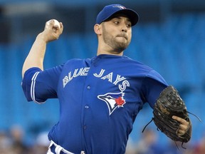 Toronto Blue Jays starting pitcher Marco Estrada throws in the first inning of their American League MLB baseball game against the Tampa Bay Rays, in Toronto on Friday, August 10, 2018.