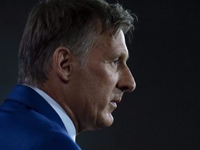 Maxime Bernier makes an announcement during a news conference in Ottawa, Thursday August 23, 2018. axime Bernier's closest caucus ally says he has no plans to join the renegade Quebec MP's new party. Conservative MP Alex Nuttall played a key role in Bernier's unsuccessful Conservative leadership campaign last year that saw him lose by the narrowest of margins to Andrew Scheer. And he's continued to be a close ally of Bernier's since then.THE CANADIAN PRESS/Adrian Wyld ORG XMIT: CPT106