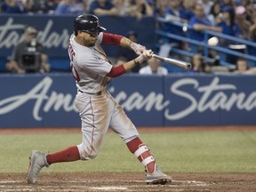 Boston Red Sox' Mookie Betts hit a home run against the Jays in the ninth inning last night, but it wasn't enough as the Jays won 8-5. (The Canadian Press)