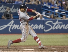 Boston Red Sox' Mookie Betts hit a home run against the Jays in the ninth inning last night, but it wasn't enough as the Jays won 8-5. (The Canadian Press)