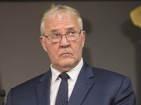 Bill Blair, federal minister of border security and organized crime reduction, attends a press conference in Toronto on Friday, August 3, 2018. The City of Toronto now has $11 million in its coffers from the federal government to pay down some costs it has incurred dealing with an influx of irregular border crossers.