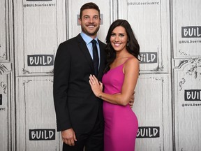 Television personalities Becca Kufrin, right, and her fiancé Garrett Yrigoyen participate in the BUILD Speaker Series to discuss the finale of ABC's "The Bachelorette" at AOL Studios on Tuesday, Aug. 7, 2018, in New York. (Evan Agostini/Invision/AP)