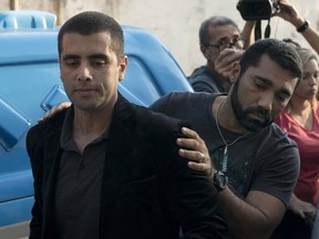 Dr. Denis Furtado, aka Dr. Bumbum, left, a Brazilian celebrity plastic surgeon, is arrested for murder.