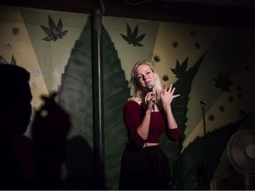 Comedian Sarah Ashby performs at the Underground Comedy & Social Club, a marijuana-friendly comedy club, in Toronto, on Friday, August 3, 2018. It's an age-old pairing that's sparked a subgenre of films, shows and standup acts: cannabis and comedy.THE CANADIAN PRESS/Christopher Katsarov ORG XMIT: CKL201