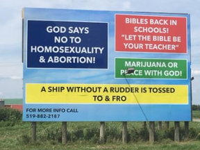 A billboard near Chatham that denounces homosexuality and abortion has been taken down, according to an activist.