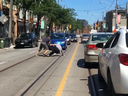 Screengrab of a brawl that broke out on College St., between Dufferin St. and Ossington Ave. on Friday.