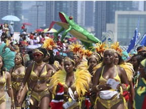 The 51st annual Toronto Caribbean Carnival took to the CNE grounds and Lakeshore Blvd. for the massive parade attended by tens of thousands of partners, masqueraders, revellers and has and pan bands on Saturday August 4, 2018. (Jack Boland/Toronto Sun/Postmedia Network)