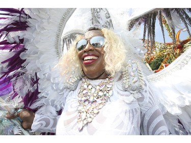 Evalina Palotta is originally from Trinidad and was wearing her Queen Charlotte's Court outfit. The 51st annual Toronto Caribbean Carnival took to the CNE grounds and Lakeshore Blvd. for the massive parade attended by tens of thousands of partners, masqueraders, revellers and has and pan bands on Saturday August 4, 2018. Jack Boland/Toronto Sun/Postmedia Network