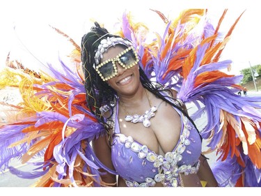 Kristina Brown, came all the way from Brooklyn , N.Y. for the party. The 51st annual Toronto Caribbean Carnival took to the CNE grounds and Lakeshore Blvd. for the massive parade attended by tens of thousands of partners, masqueraders, revellers and has and pan bands on Saturday August 4, 2018. Jack Boland/Toronto Sun/Postmedia Network