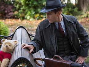 Christopher Robin (Ewan McGregor) and Winnie the Pooh in a scene from "Christopher Robin."