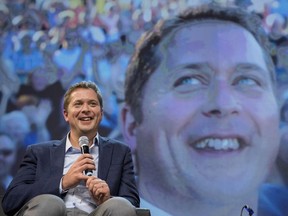 Conservative Leader Andrew Scheer is seen on stage while speaking to delegates at the Conservative national convention in Halifax on Saturday, August 25, 2018.