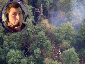 The site on Ketron Island in Washington state where an Horizon Air turboprop plane crashed after it was stolen from Sea-Tac International Airport is seen from the air, Saturday, Aug. 11, 2018, near Steilacoom, Wash. Richard Russell (inset) died in the crash. (AP Photo/Ted S. Warren/Richard Russell/YouTube via AP)