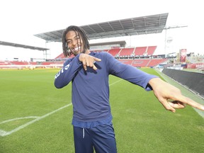 Two-time all-star wide receiver Duron Carter strikes a pose at BMO Field on Monday. Carter officially joined the Argonauts. (Jack Boland/Toronto Sun)