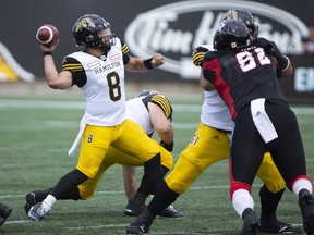 Hamilton Tiger-Cats quarterback Jeremiah Masoli (8) throws during first half CFL football game action against the Ottawa Redblacks in Hamilton, Ont. on Saturday, July 28, 2018. THE CANADIAN PRESS/Peter Power