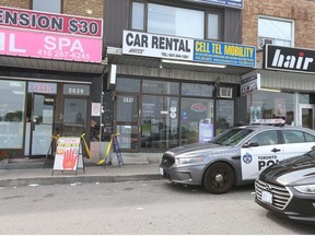 A man is in hospital in life-threatening condition after being shot inside a derelict apartment at the rear of 2639 Eglinton Ave. E. near Brimley Rd. Police were on scene investigating on Saturday August 25, 2018. Jack Boland/Toronto Sun/Postmedia Network
