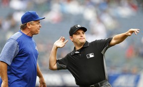 First base umpire Jansen Visconti throws Toronto Blue Jays manager John Gibbons out of the game against the New York Yankees in the sixth inning in New York, on Sunday. (AP)