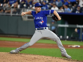 Blue Jays' Ken Giles  throws in the ninth inning against the Kansas City Royals at Kauffman Stadium on Aug. 14, 2018, in Kansas City. (GETTY IMAGES)