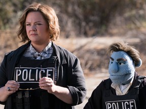 This image released by STX Entertainment shows Melissa McCarthy in a scene from "The Happytime Murders." (Hopper Stone/STX Entertainment)