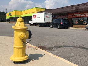 A man was gunned down in the parking lot of a Rexdale plaza, located at Martin Grove Rd. and John Garland Blvd., in a suspected drive-by shooting around 11:30 p.m. on Wednesday, Aug. 15, 2018. (Chris Doucette/Toronto Sun/Postmedia Network)