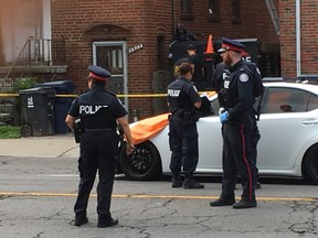 Toronto Police at the scene of a fatal shooting in the Jane and Weston area on Wednesday, Aug. 22, 2018. (Kevin Connor/Toronto Sun)