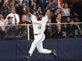 Toronto Blue Jays star Joe Carter celebrates his game-winning home run in the ninth inning of Game 6 of the World Series in Toronto on October 23, 1993. (THE CANADIAN PRESS/AP, Mark Duncan)