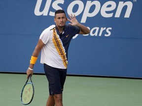 Nick Kyrgios, of Australia, reacts against Pierre-Hugues Herbert, of France, during the second round of the U.S. Open tennis tournament, Thursday, Aug. 30, 2018, in New York.