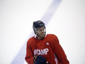 The Edmonton Oilers' Connor McDavid smiles during the BioSteel Pro Hockey Camp on Monday. (Cole Burston/The Canadian Press)