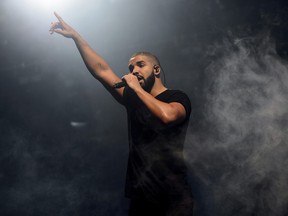 In this June 27, 2015 file photo, Drake performs on the main stage at Wireless festival in Finsbury Park, London.  (Photo by Jonathan Short/Invision/AP, File)