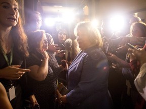 Lisa Thompson, Ontario's Minister of Education turns away from reporters after a scrum following Question Period, at the Queens Park Legislature in Toronto on Thursday, August 9, 2018.