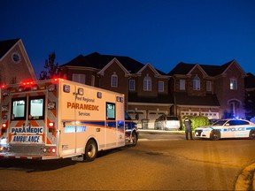 A woman and a boy were pronounced dead after being pulled from a pool. (JOHN HANLEY PHOTO)