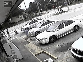 In this frame from surveillance video released by the Pinellas County Sheriff's Office, Markeis McGlockton, far left, is shot by Michael Drejka during an altercation in the parking lot of a convenience store in Clearwater, Fla., on July 19, 2018. (Pinellas County Sheriff's Office via AP, File)