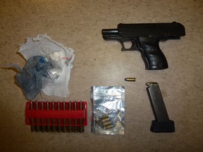Handgun, ammunition and drugs was allegedly seized as the intended target of the June 14 Scarborough playground shooting was arrested on Aug. 31, 2018. (Toronto Police handout)