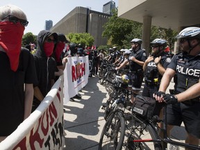 Toronto Against Fascism holds a rally at Nathan Phillips Square intending to confront the Anti-Muslim Organization that had planned a demonstration but never showed on Saturday, Aug. 11, 2018. Toronto Police were on hand to maintain order. (Stan Behal/Toronto Sun/Postmedia Network)