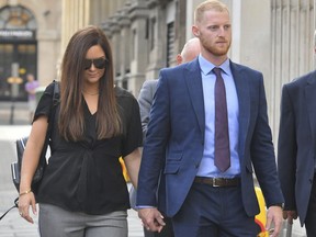 England cricketer Ben Stokes, with his wife Clare, arrive at Bristol Crown Court accused of affray, Tuesday Aug. 7, 2018. The 27-year-old cricket all-rounder and two other men, are jointly charged with affray following an alleged street brawl in September last year. Stokes contests the affray charge. (BEN BIRCHALL/AP)