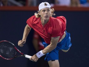 Denis Shapovalov and partner Felix Auger-Aliassime lost their doubles match against Novak Djokovic and Kevin Anderson 6-3, 6-2 on Monday night at the Rogers Cup.  
THE CANADIAN PRESS/Paul Chiasson ORG XMIT: CPT106