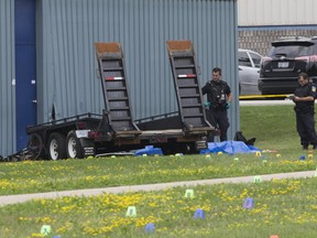 Peel police at the scene after a cyclist was killed on Summerlea Road in Brampton Wednesday August 1, 2018. Stan Behal/Toronto Sun